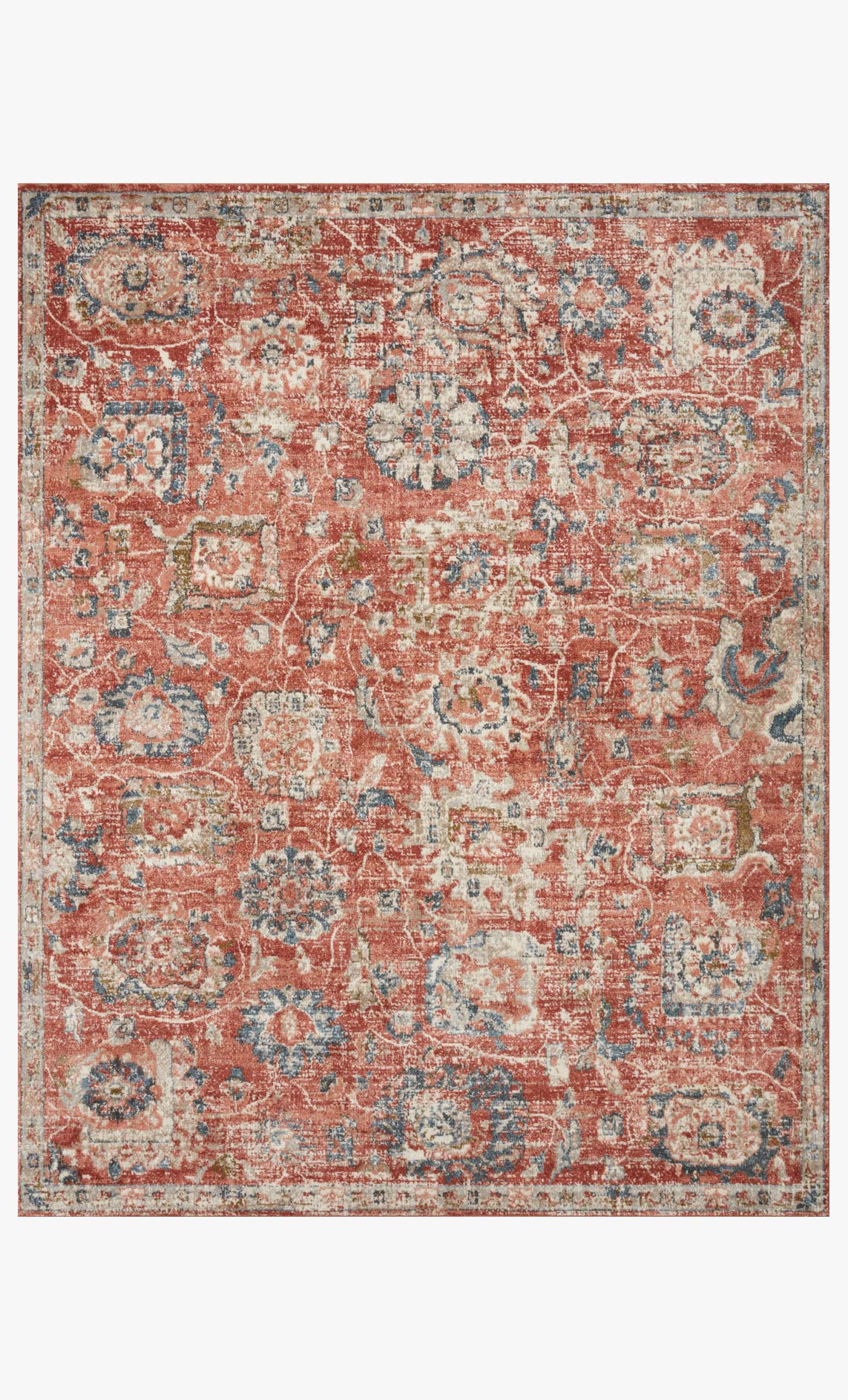 Rust and blue traditional power-loomed rug with ornate medallion pattern.