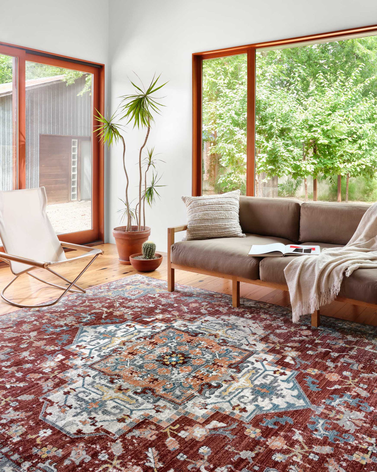 Brick and grey transitional rug with ornate distressed geometric medallion design