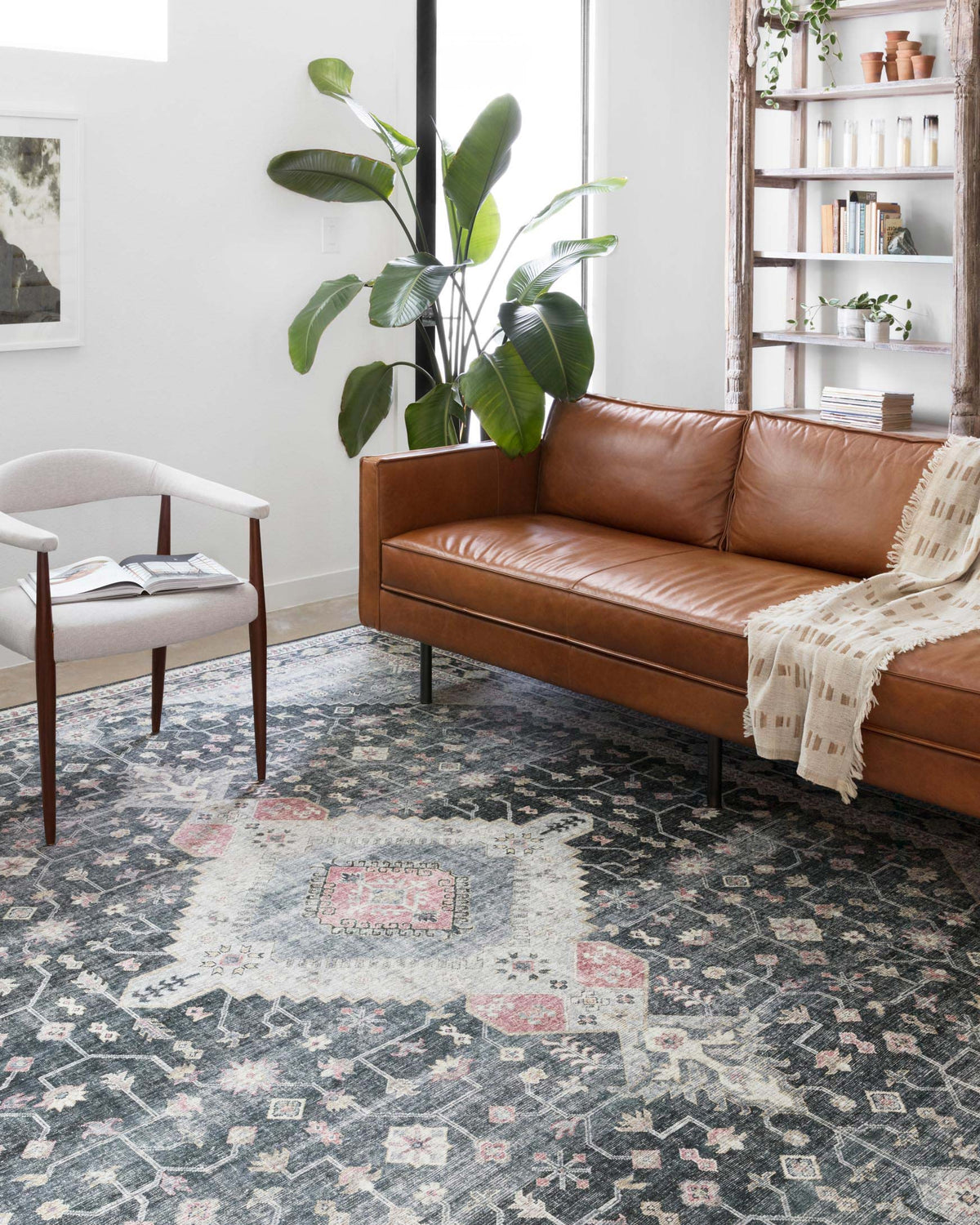 Traditional power-loomed area rug in charcoal gray with ornate geometric medallion pattern