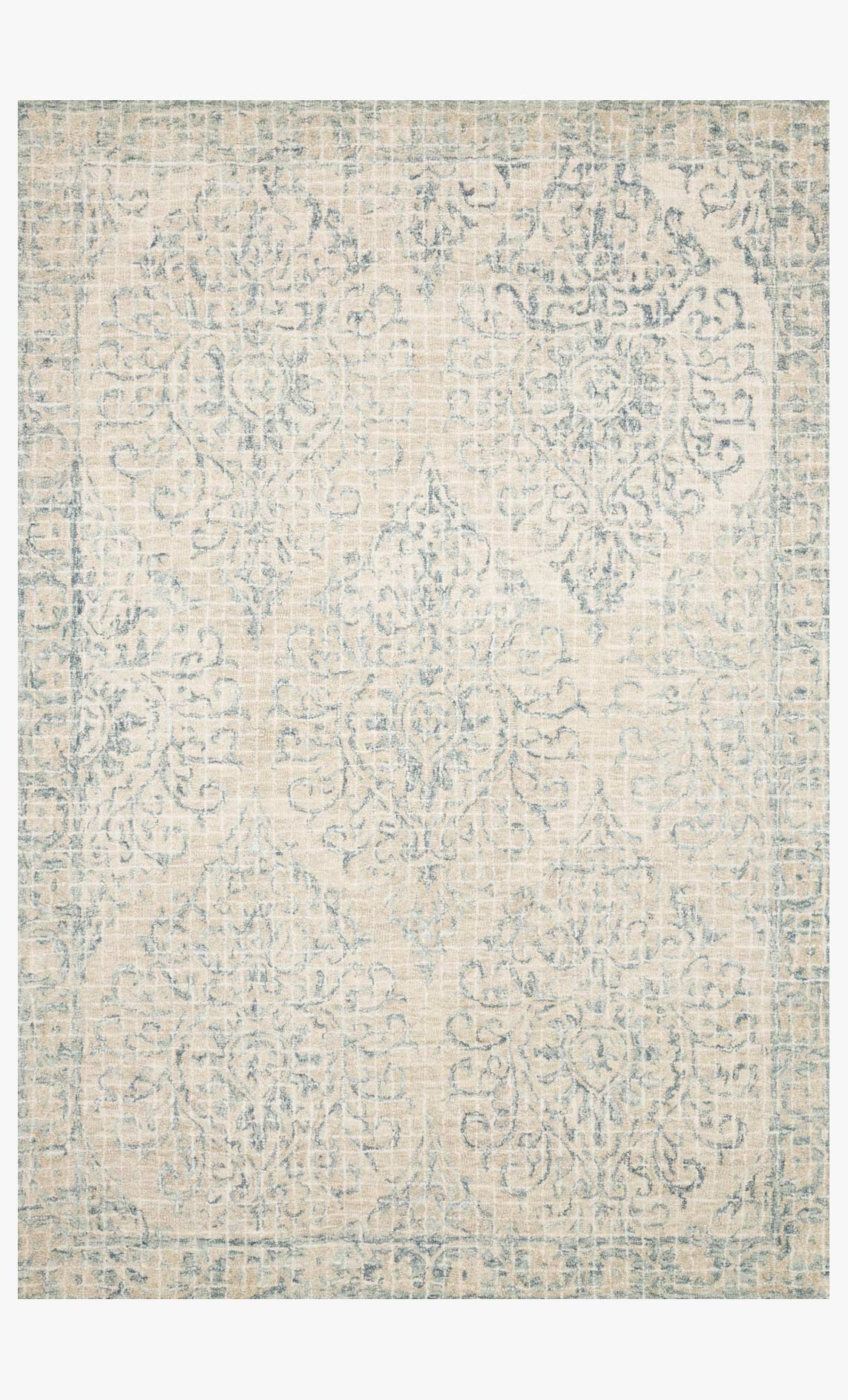 Transitional hooked rug in light beige with sky-blue abstract pattern, flat view
