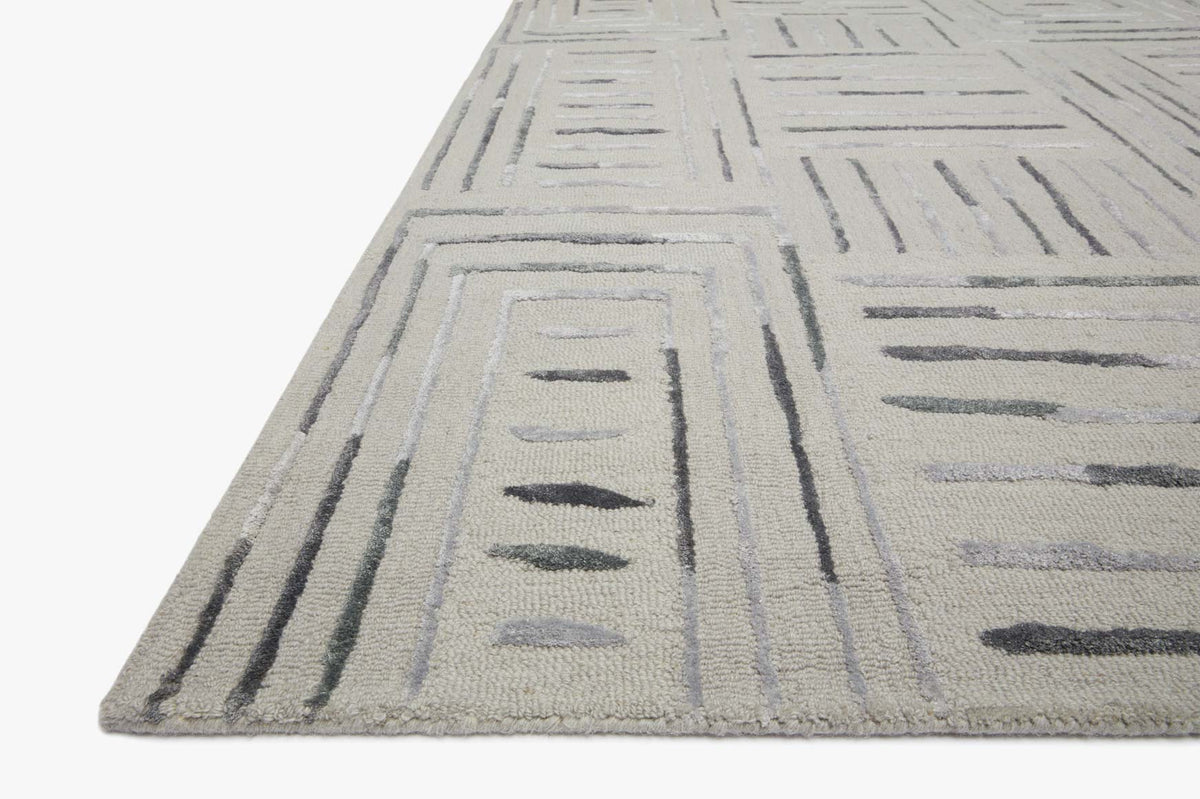 Contemporary hand-tufted rug with slate geometric lines on light silver