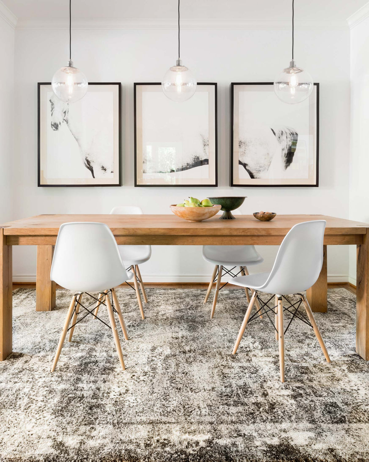 Contemporary power-loomed area rug with distressed black-and-ivory geometric pattern