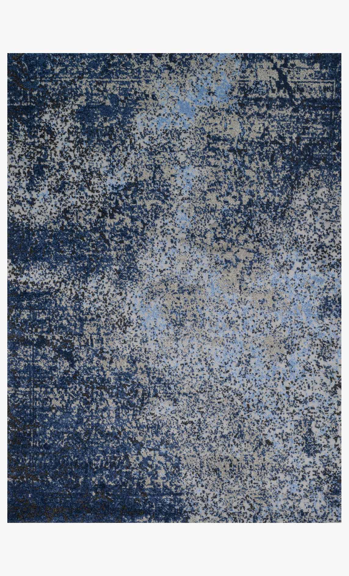 Contemporary power-loomed rug with speckled abstract pattern in grey and navy.