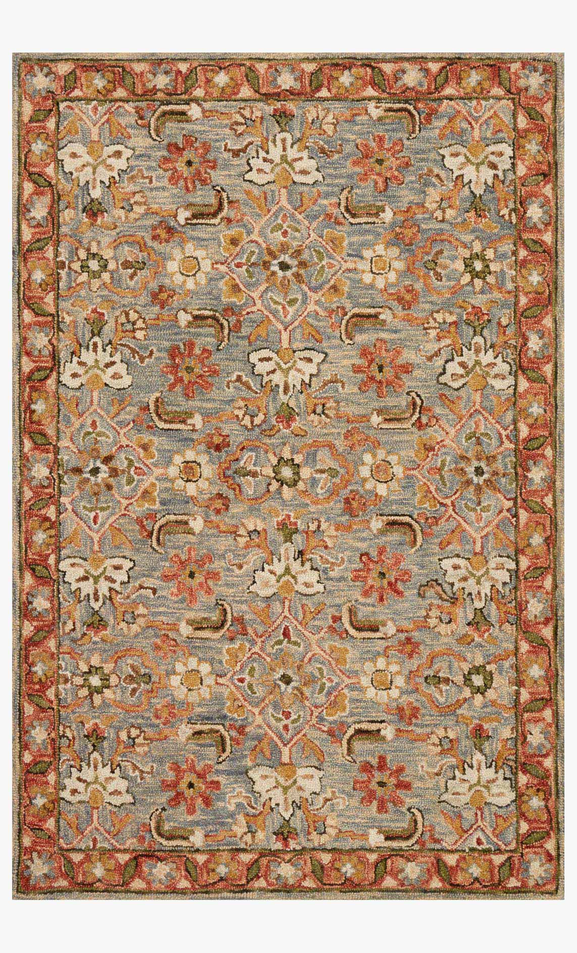 Traditional hooked rug with ornate slate and terracotta medallion pattern and border