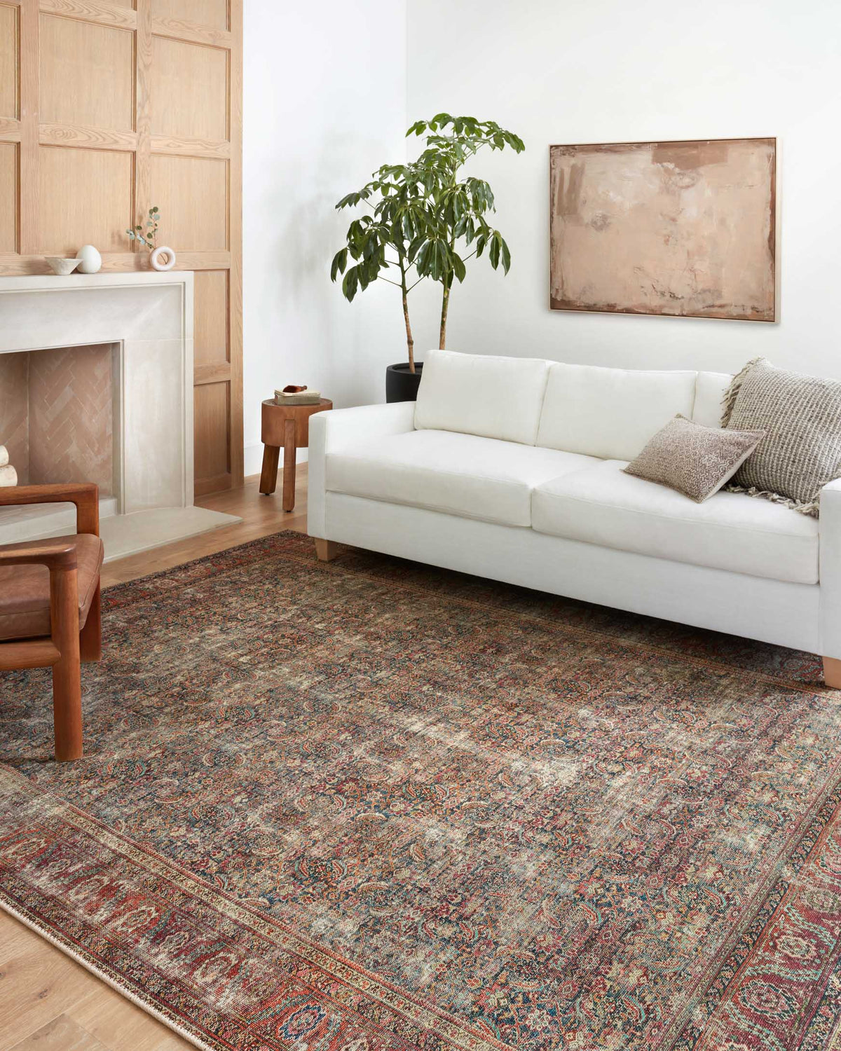 Traditional power-loomed rug with multicolor distressed pattern and detailed border