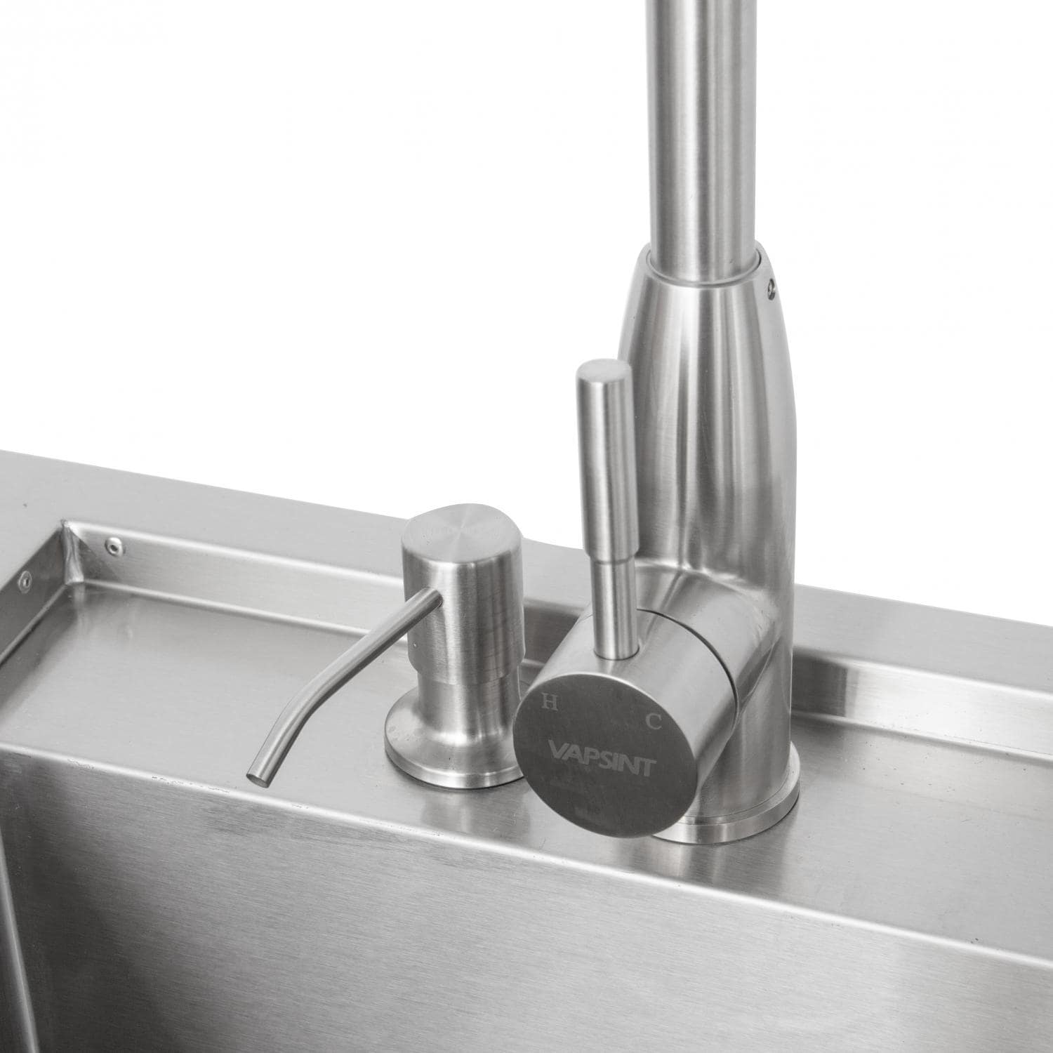 Stainless steel sink with tall faucet and deck mount control knob