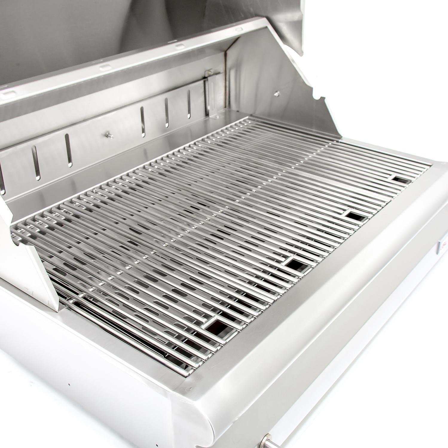 Stainless steel charcoal grill grate inside open hood with recessed firebox