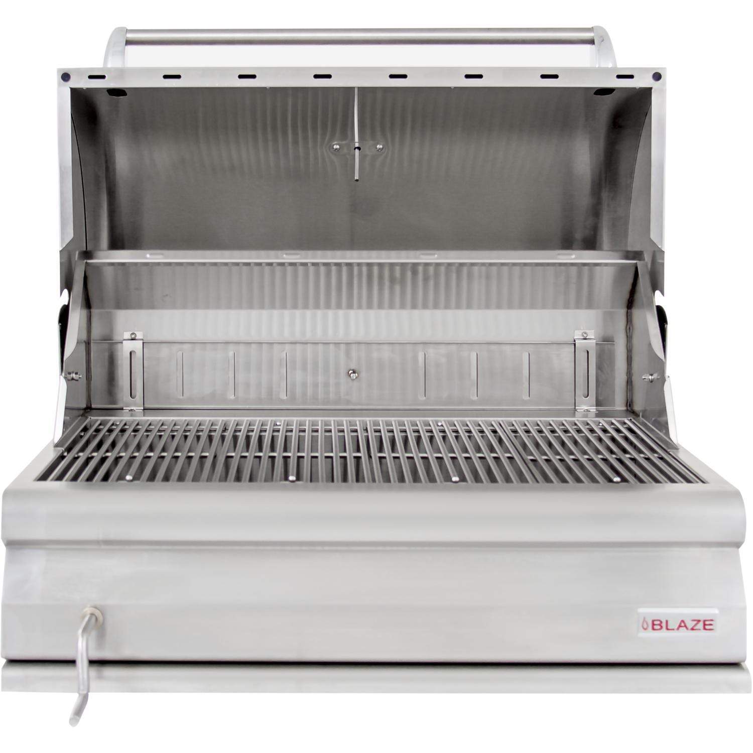 Open stainless steel charcoal grill firebox with cooking grate and adjustable tray