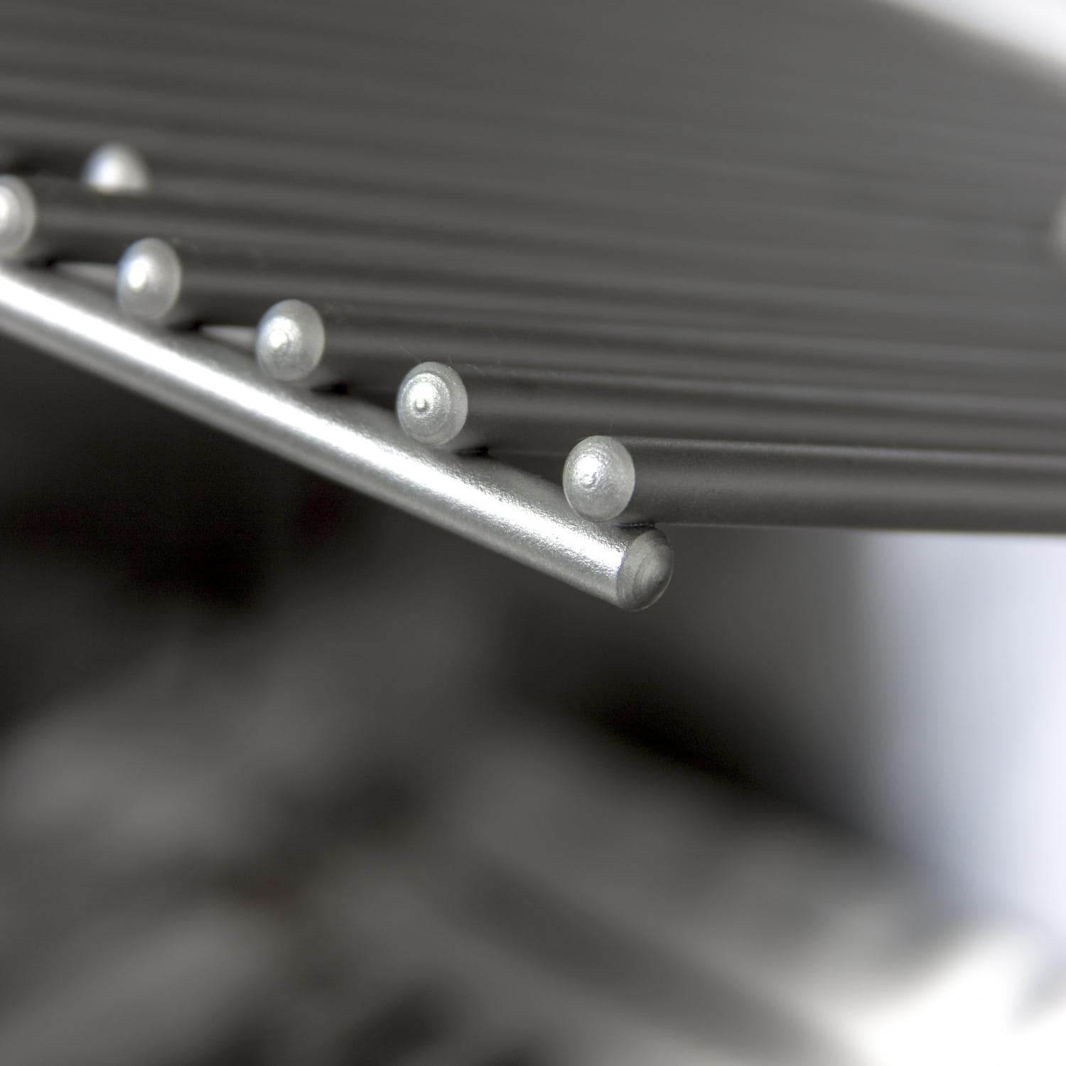 Stainless steel grill hardware: round knobs on control bar