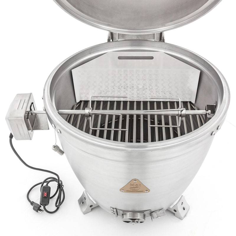 Kamado-style grill with rotisserie rack and spit installed inside cooking chamber