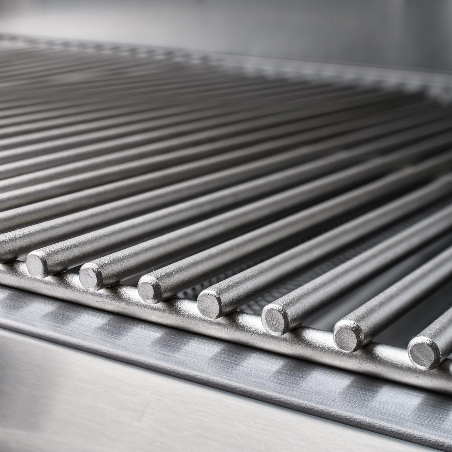 Stainless steel grill burner tubes with circular electrode caps