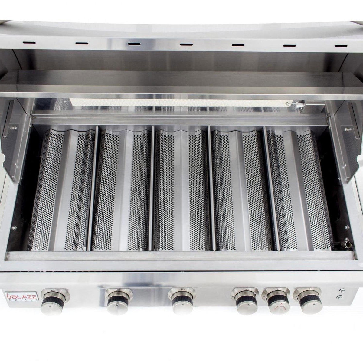 Grill burner compartment with perforated stainless burner tubes and control knobs
