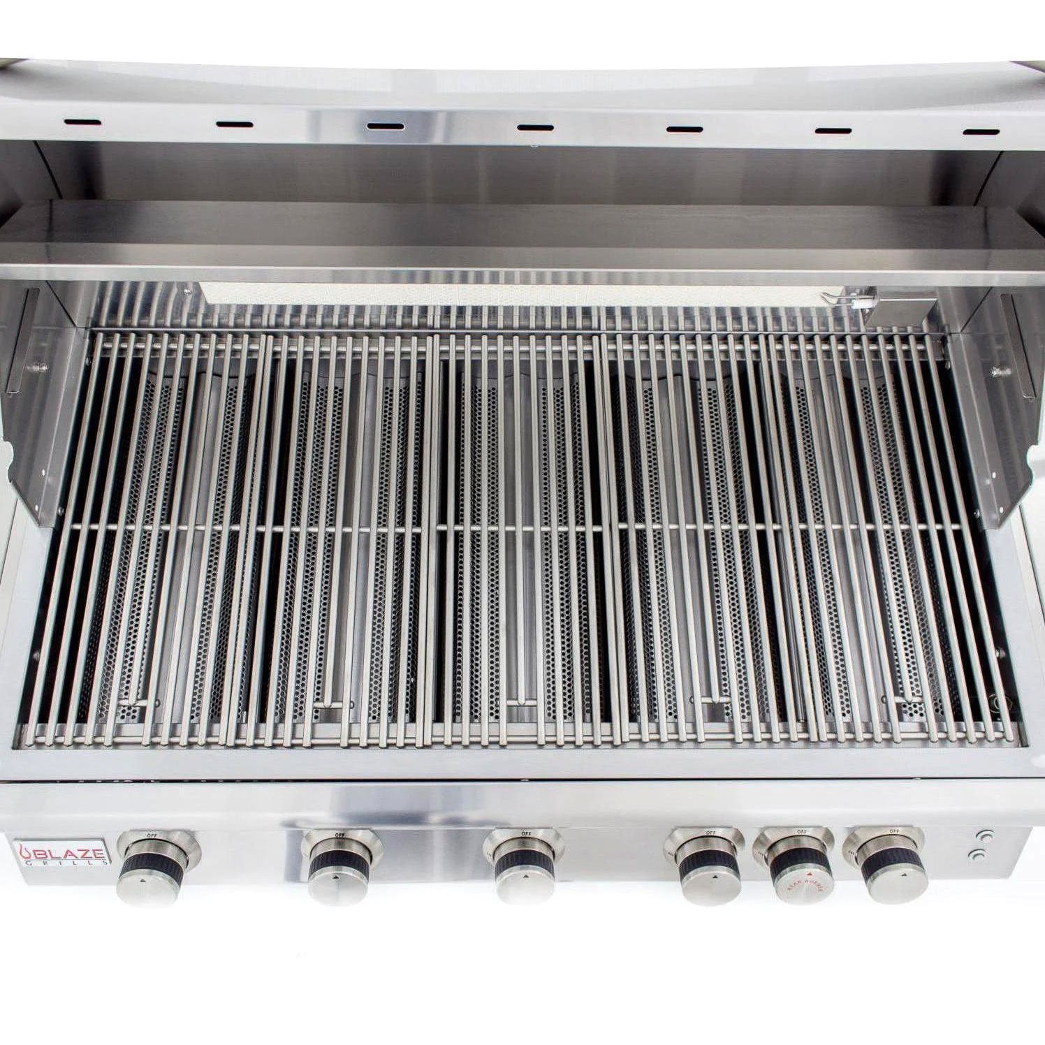 Stainless steel cooking grates inside open grill firebox