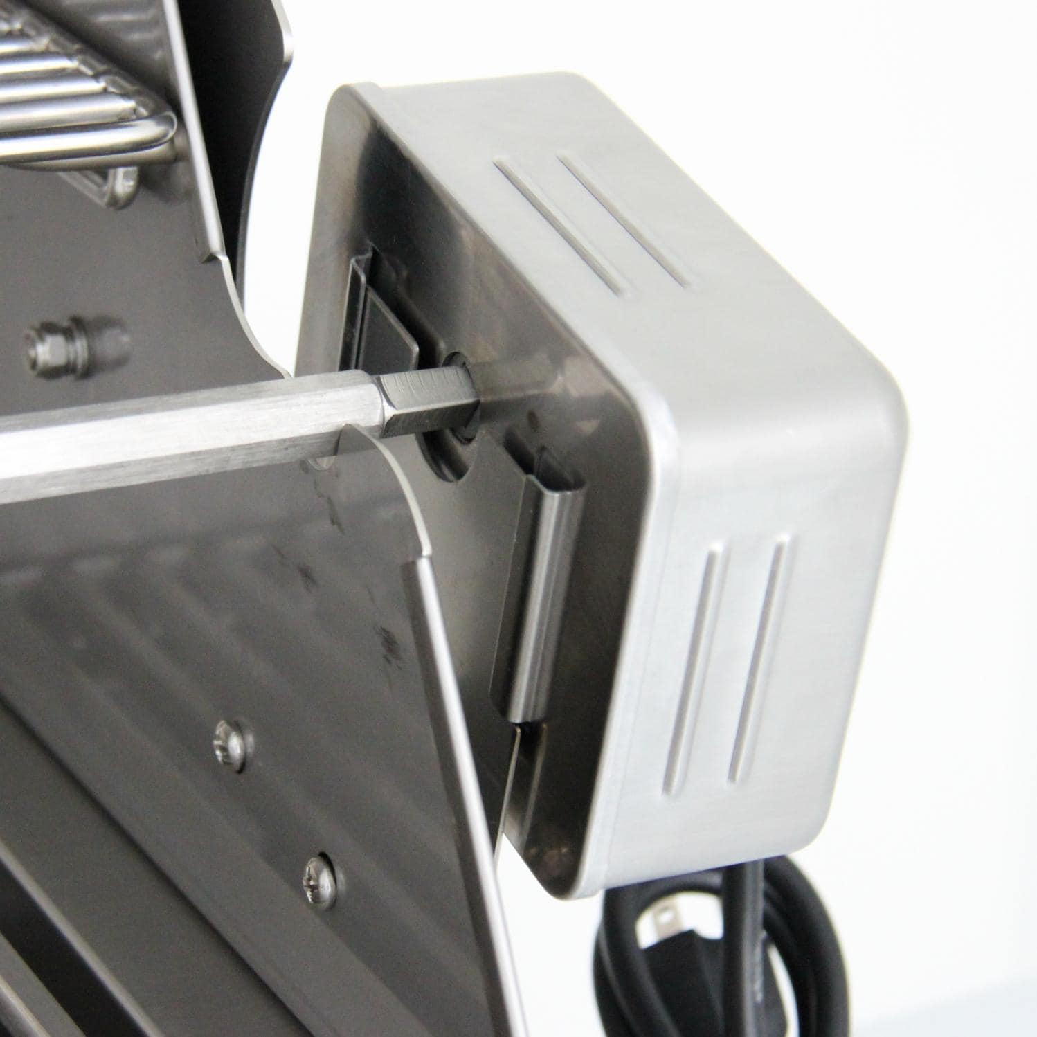 Stainless steel control housing with side burner cover and connection hose opening