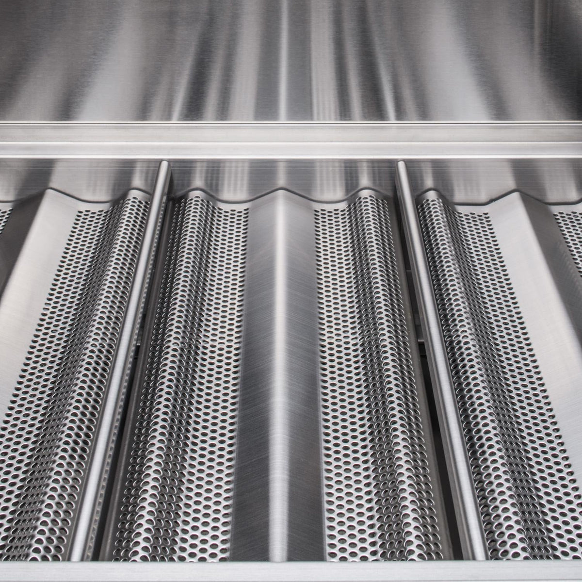 Stainless steel burner tubes with honeycomb perforations inside the grill