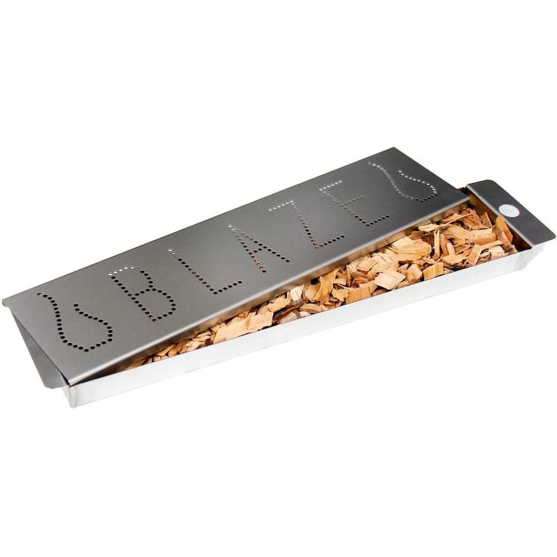 Stainless steel smoker box with perforated top and visible wood chips
