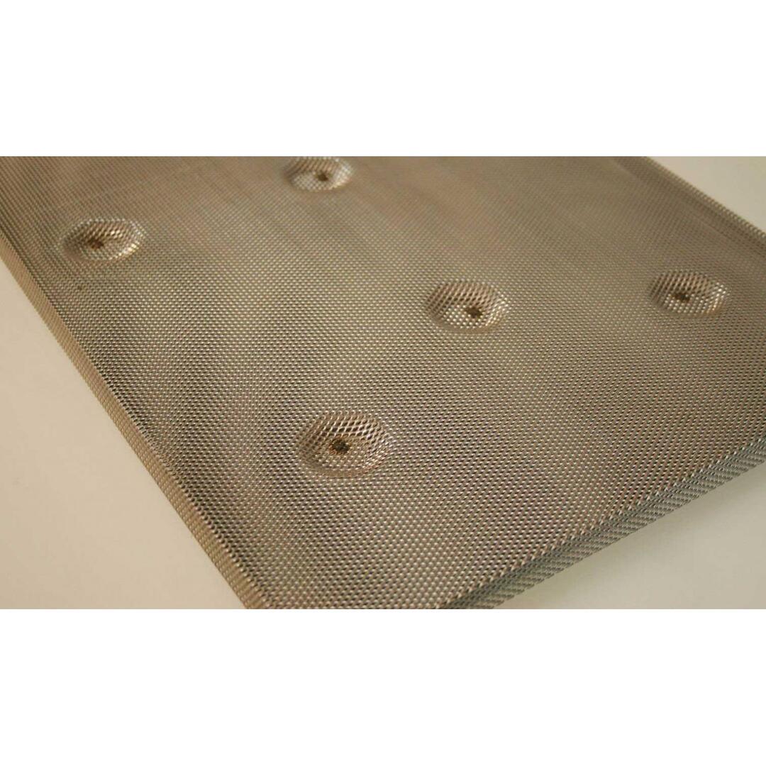 Stainless steel flavor screen with round perforations and four mounting bolts