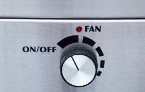 ON/OFF fan control knob on stainless steel hood panel