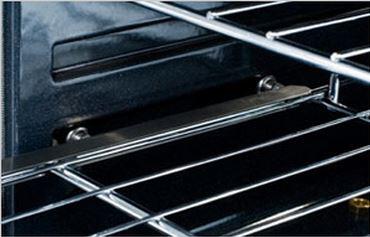Gas range oven broiler area with exposed heating element and rack rails