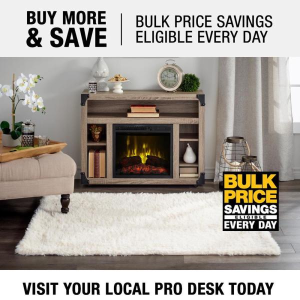 Distressed oak media console with electric fireplace, side shelves, and top storage