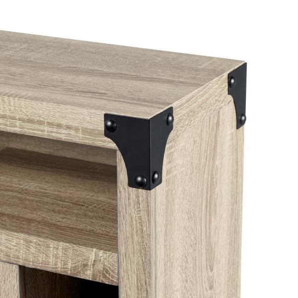 Distressed oak corner bracket detail with black metal hardware on media console