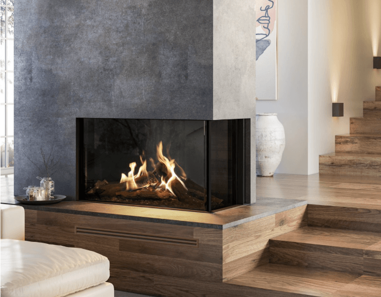 Two-sided built-in gas fireplace in modern hearth, black glass front with active flames.