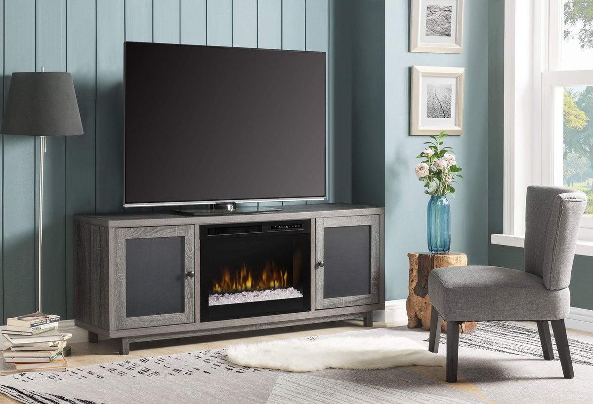 Gray electric fireplace media console with open firebox and glass ember bed