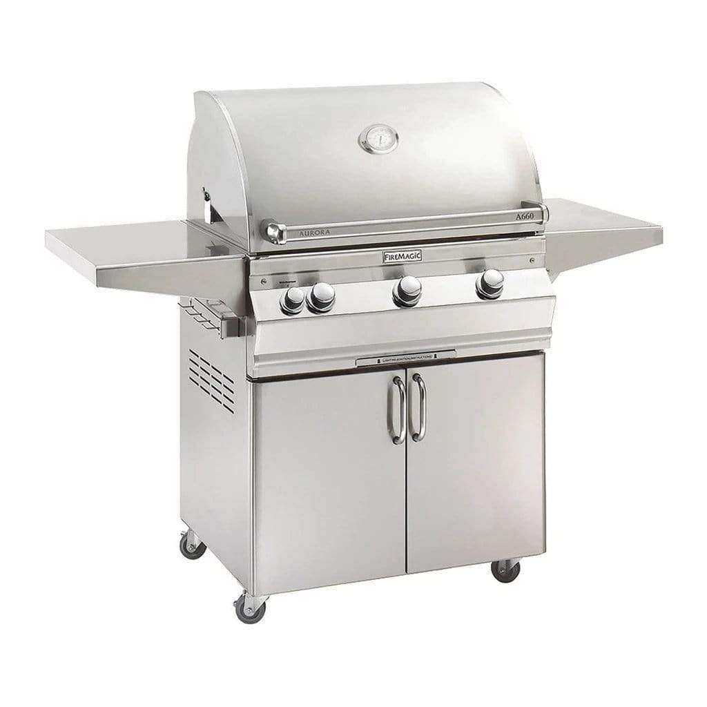 Stainless steel Fire Magic portable gas grill with lid and front control knobs