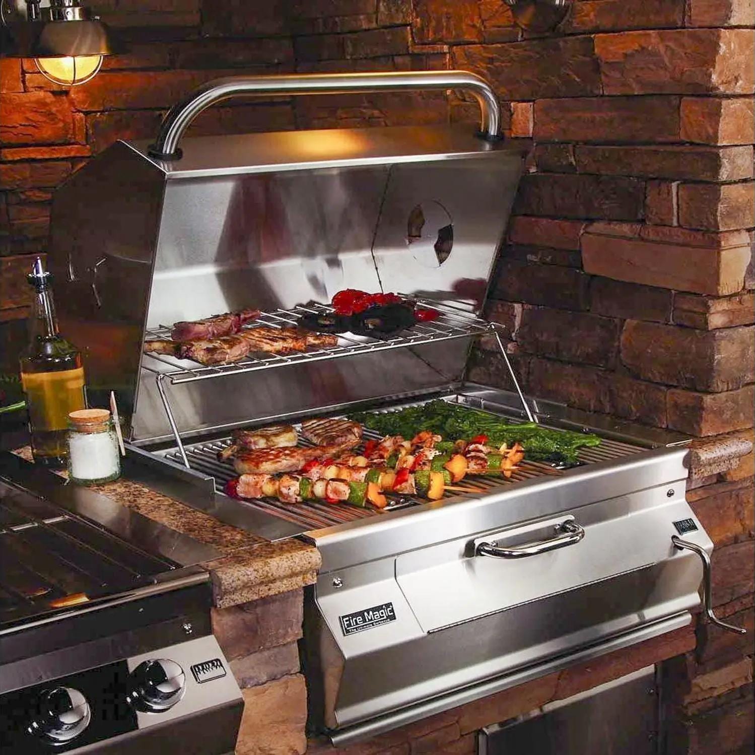 Stainless steel charcoal smoker grill with cooking grates and open hood