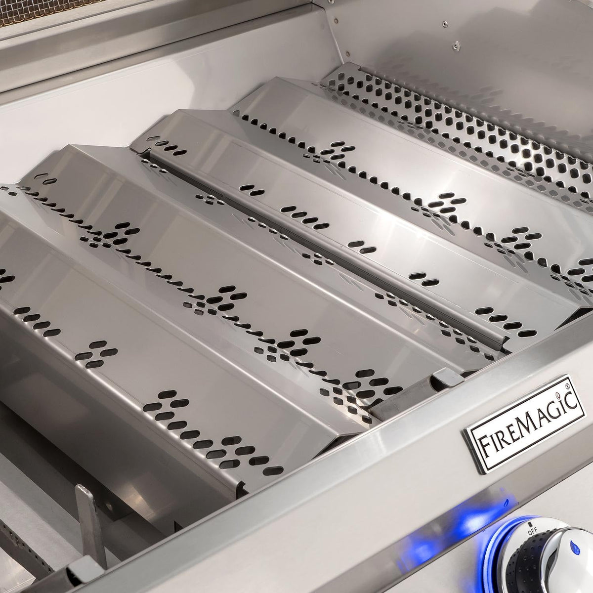 Stainless infrared burner tray set inside built-in natural gas grill