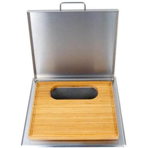 Stainless steel trash chute with attached bamboo cutting board and oval handle slot