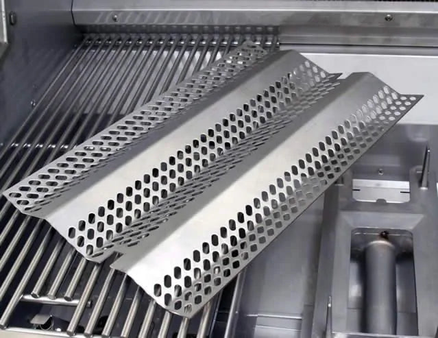 Stainless steel grill burner heat deflectors with perforated vent holes