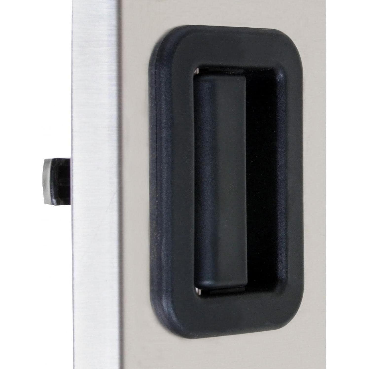 Close-up of black handle on stainless steel access door with side latch mechanism
