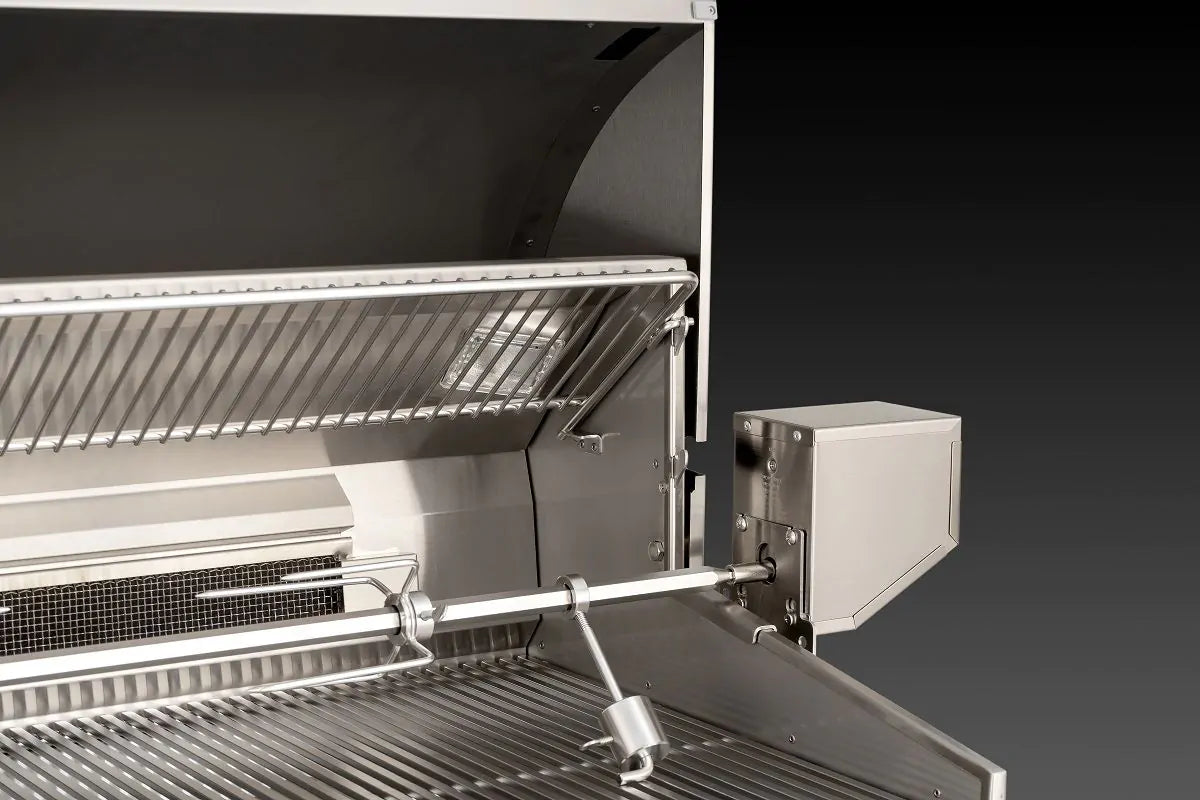 Fire Magic grill interior with cooking grates and side-mounted rotisserie motor box
