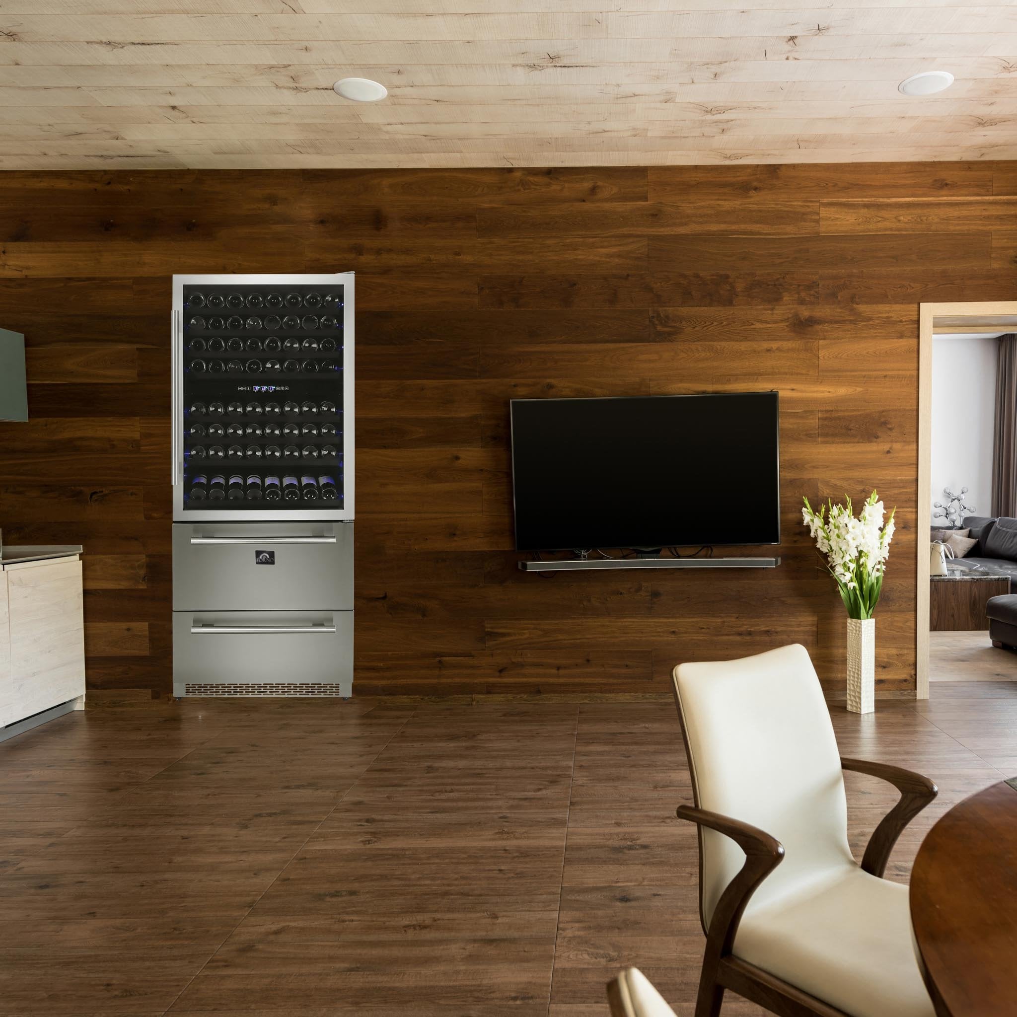 Freestanding dual zone wine cooler in cabinet-style housing with LED-lit glass door