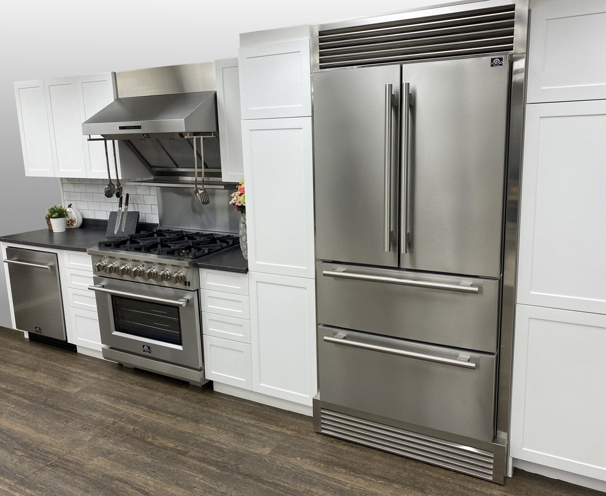 Stainless French door refrigerator with bottom double freezer drawers, doors closed
