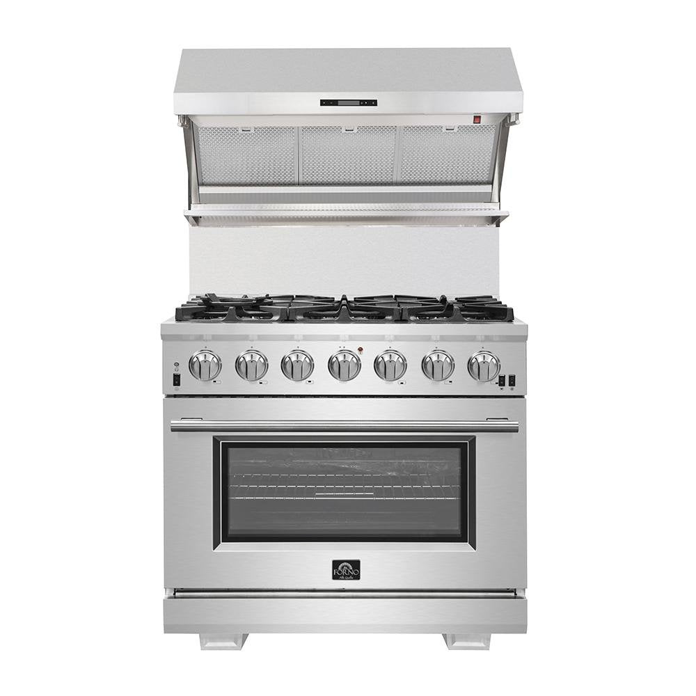 Stainless kitchen range with wall mount hood above, vent filters, and controls