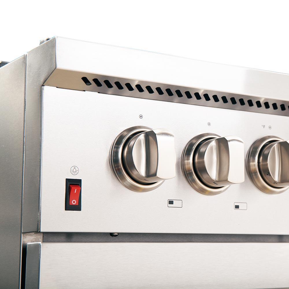 Stainless range hood front with round fan controls and illuminated switch