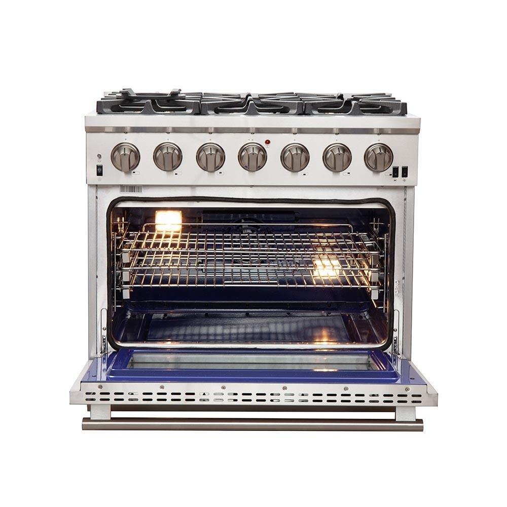 Stainless steel gas range with open oven door and oven racks inside
