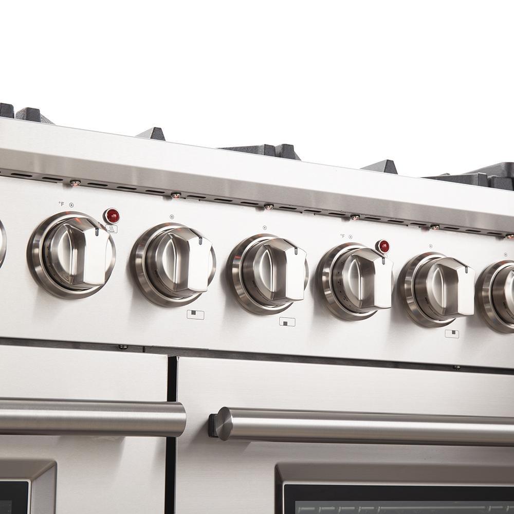 Stainless steel gas range control panel with six large burner knobs and switches
