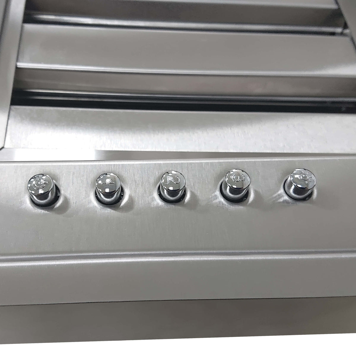 Stainless steel range hood insert control knobs on brushed metal panel