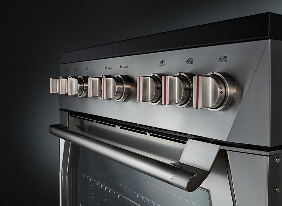 Stainless steel gas range with front control knobs and open burner grates