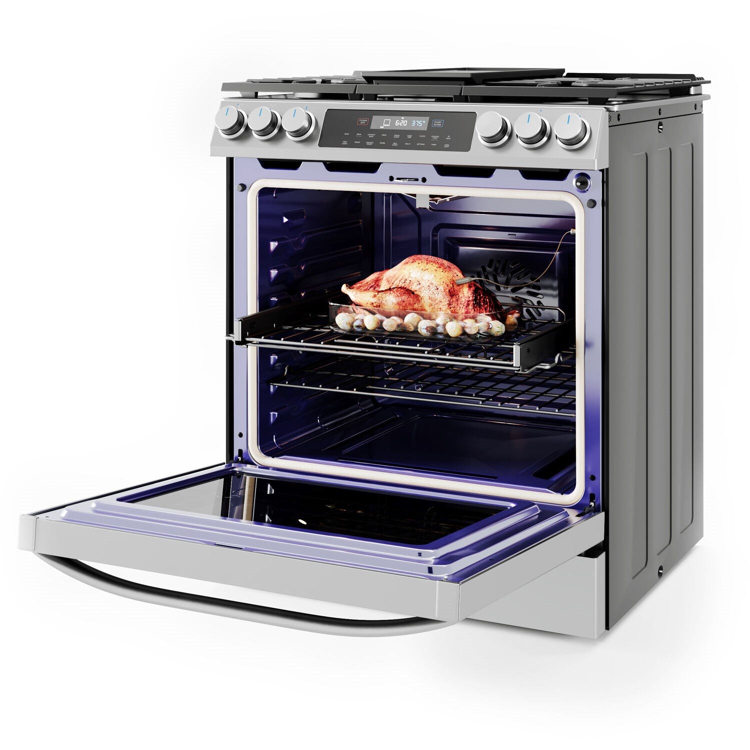 Stainless steel gas oven door open with roasted chicken inside on rack