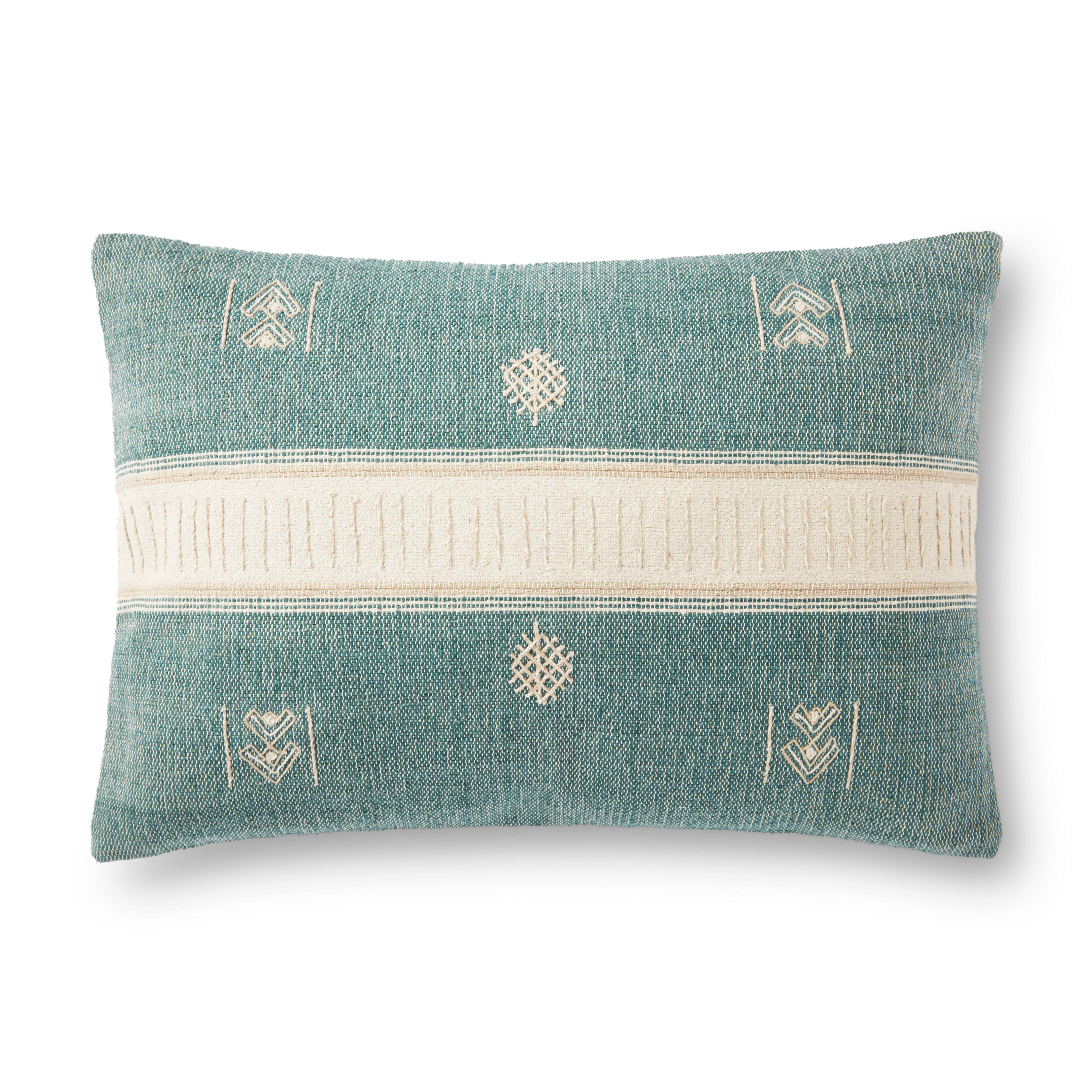Green and natural decorative pillow with geometric embroidery and fringe trim