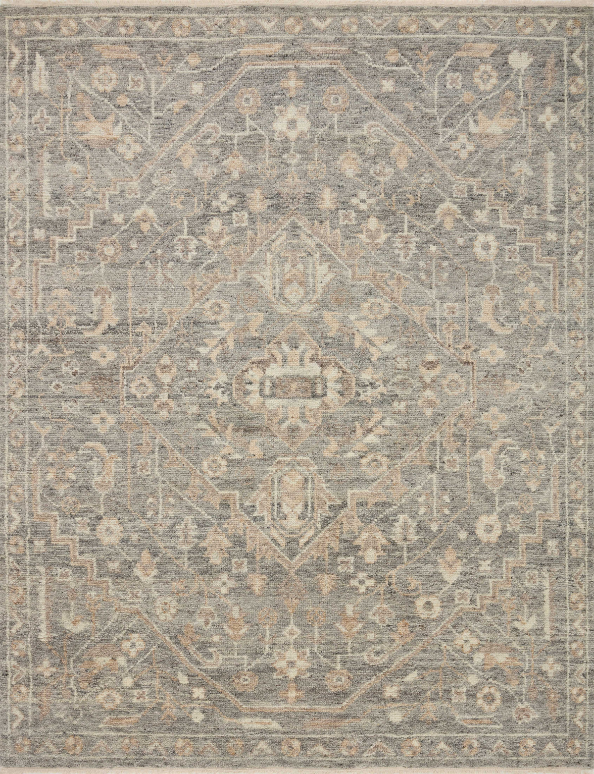Traditional wool rug with ornate geometric medallion pattern in light gray and beige tones