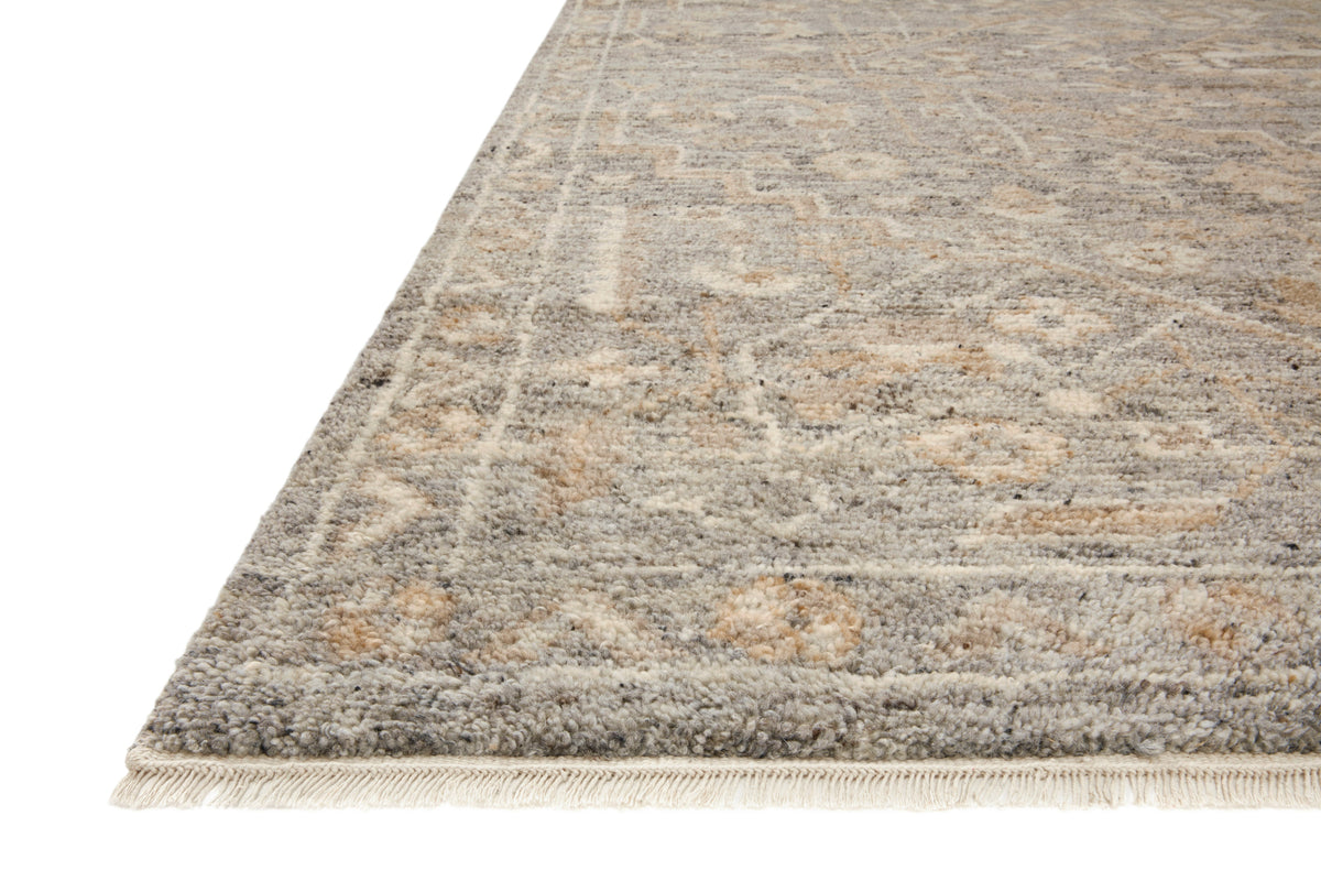 Traditional wool pile hand-knotted rug in gray-brown distressed pattern, fringed edge