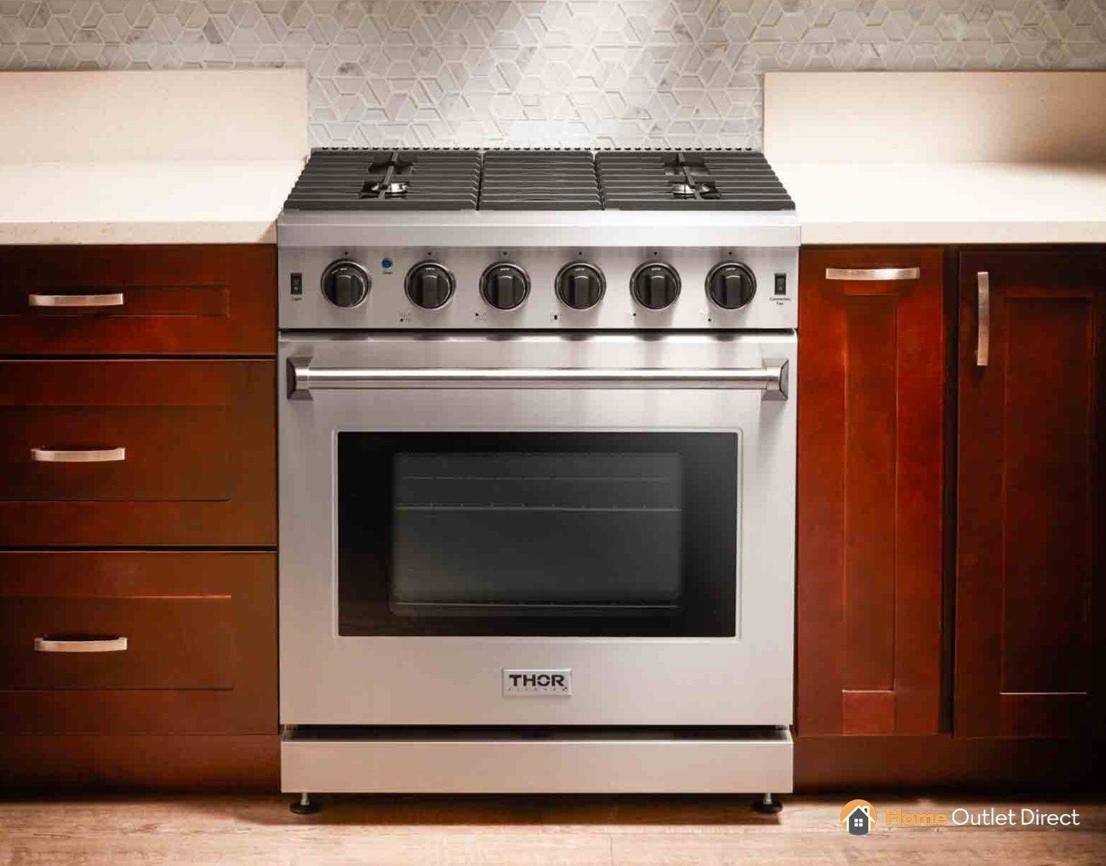 Thor Kitchen 30-inch gas range with oven door closed and control knobs