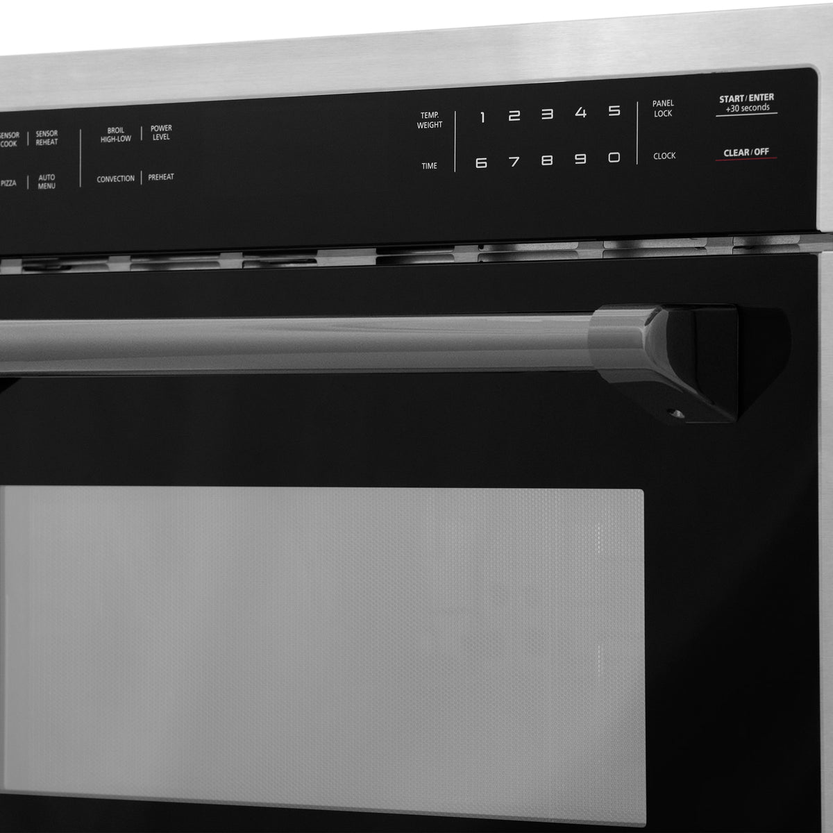 Microwave oven control panel and matte black handle, with illuminated numeric keypad.