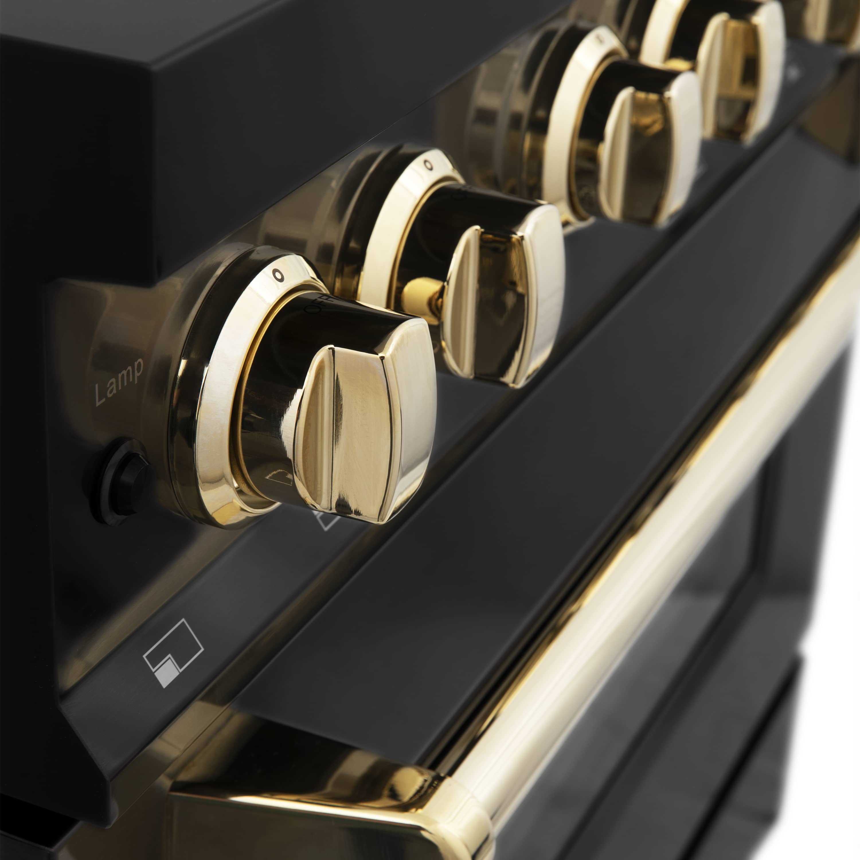 Black range controls with gold-accent knob set and chrome trim along the panel