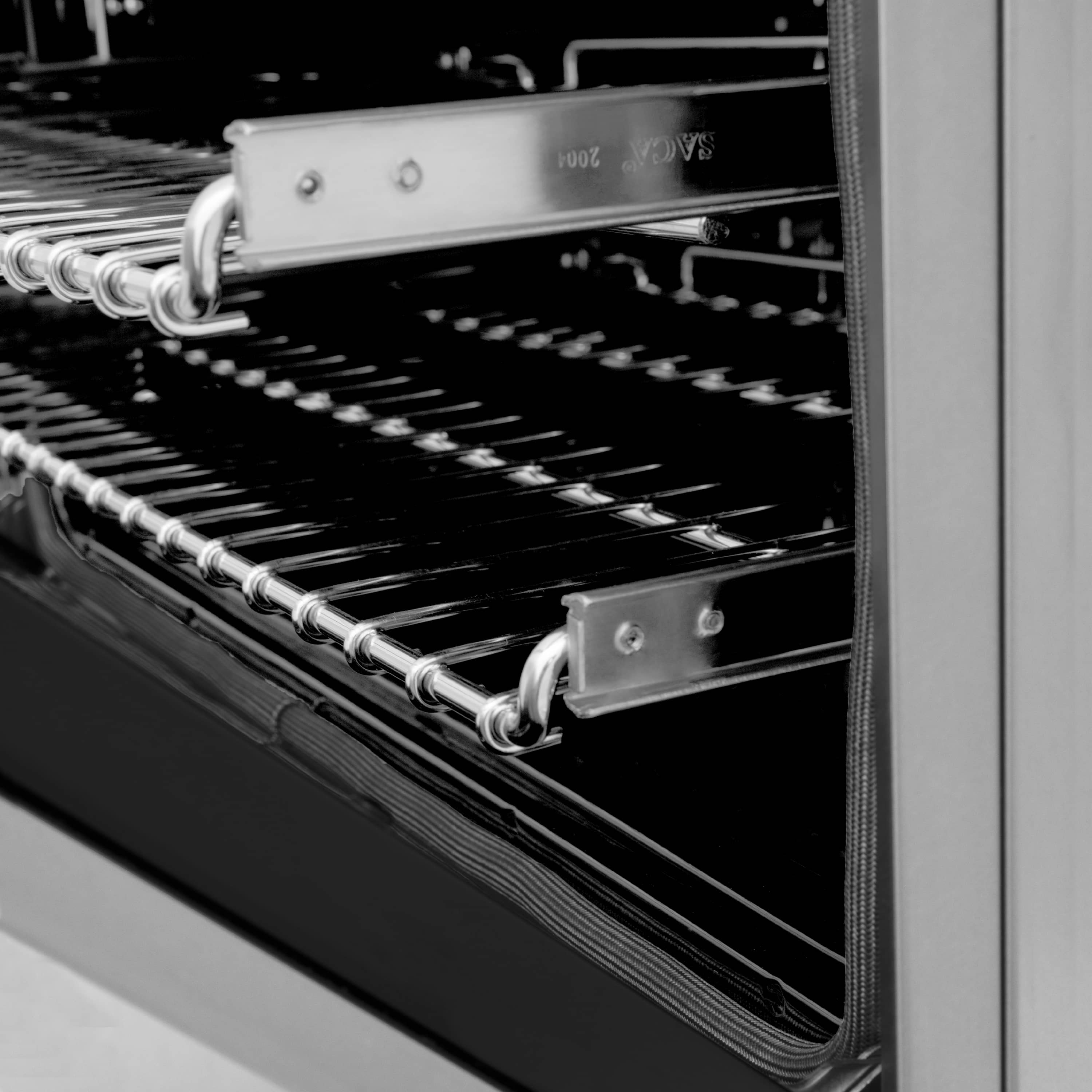 Dual fuel range oven rack with metal rails and black interior surround